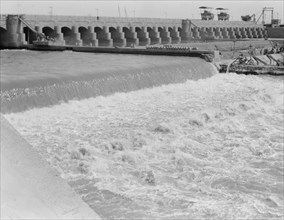 Hindiyah Barrage in Iraq, about 48 miles southeast of Baghdad. Foaming waters coming through the sluices ca. 1932