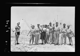 Maalek Hachamisha (Maale Hachamisha) Kibbutz (2 kilometers W. of Anavim). Group photo of colonials or immigrants ca. 1939