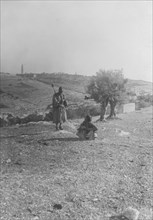As seen from the northwest, the Mount of Olives and Bethany, a man talking ca. 1900