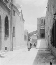 People walking on the Via Dolorosa in Israel, beginning at St. Stephen's Gate, traditionally the Second Station of the Cross ca. 1900