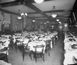 Empty tables in the dining room of the George Washington Inn ca.  between 1910 and 1926
