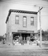 E.J. Newcomb store and laundry ca.  between 1910 and 1935