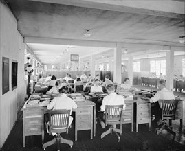 Workers in the Personnel Records Division Trouble and Typing Group ca.  between 1910 and 1935