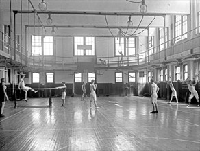 Men working out in a YMCA gymnasium ca. 1910 to 1925