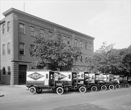 Parked Ford Motor Company, Holmes trucks ca.  between 1910 and 1935