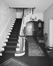 Stairway inside an early 1900s house ca.  between 1910 and 1935