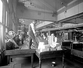 Workers inside the city post office sorting mail [Washington, D.C.] ca. between 1910 and 1925