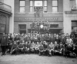 Group photo taken outside of the H. Addison Bowie builiding ca.  between 1910 and 1925