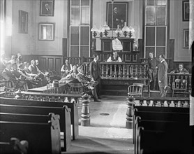 Interior of a courtroom while a trial is in session ca.  between 1910 and 1926