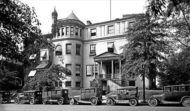Cars parked outside the National League of Women Voters office ca.  between 1910 and 1926