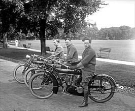 Motorcycle team, three men on motorcycles ca.  between 1910 and 1926