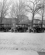 Parked U.S. Mail trucks ca.  between 1910 and 1935