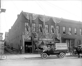 J.F. Campbell Hardware & Stoves, Anacostia, D.C.; decorated with American flags and bunting ca.  between 1910 and 1920