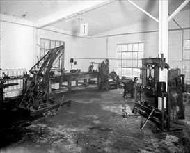 Worker inside the Sterrett & Fleming shop ca.  between 1910 and 1926