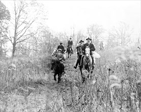 Men and boy on horses during hunt in Virginia ca.  1910