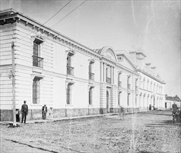 University & Post Office, San Salvador. Building of the Universidad Nacional, currently known as Universidad de El Salvador, in San Salvador, the capital city of El Salvador ca.  between 1909 and 1920