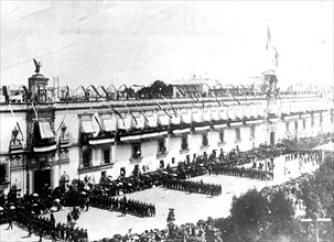 Troops marching in front of the National Palace, Mexico City ca.  between 1909 and 1920