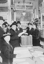 Labor leader, a voter--Samuel Gompers, president of the American Federation of Labor, casting his ballot in his home district ca.  1910