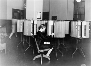 A woman worker at the C&P Telephone Company ca. between 1909 and 1932