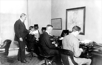 Men working in the wire room in the White House ca. between 1909 and 1932