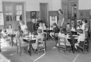 Wilson's Teacher's college student teaching young elementary age children ca. between 1909 and 1940