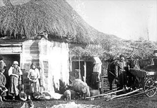 Men and women in a Russian village ca. between 1909 and 1920