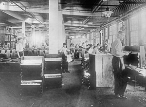 Workers making toy pianos ca. between 1909 and 1919