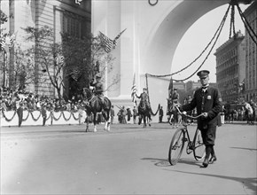 General Pershing saluting during a parade, [Washington., D.C] ca. between 1909 and 1940