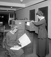 Women at work in the War Risk office, A.E.F. files ca. between 1909 and 1940