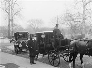 Secretary of State Robert Lansing standing outside a carriage ca. between 1909 and 1920