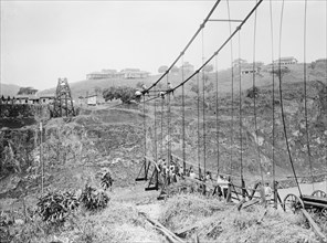 Panama Canal. Workers dismantling Empire suspension bridge ca. between 1909 and 1919