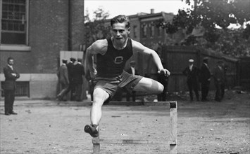 Early 20th century male hurdler ca. between 1909 and 1923