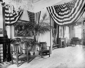 Home Club, east ballroom looking south, bunting and flags hanging, Washington., D.C. ca. between 1909 and 1920