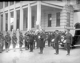 Military group salute with President Harding ca. between 1909 and 1940