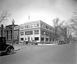 Cars parked outside the offices of the United states Daily ca. between 1909 and 1940