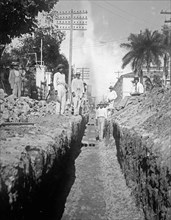 Laying telephone wires in San Salvador El Salvador ca. between 1909 and 1920