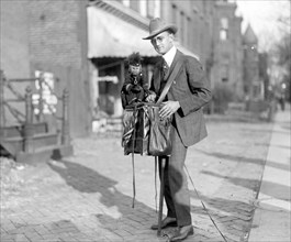 Herbert E. French, photographer [with monkey] ca. between 1909 and 1932