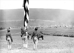 National Guard soldiers raising the American flag at Harper's Ferry, W.Va. ca. between 1909 and 1940