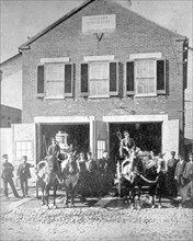 Fire house with horse drawn engines, Washington., D.C. ca. between 1909 and 1940