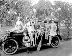 Mack Sennett Girls standing on a car ca.  between 1918 and 1928