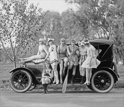 Mack Sennett girls posing with a car ca.  between 1918 and 1920