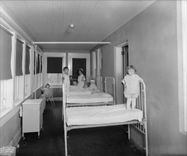 Nurse and little children at the Washington Sanitarium, [Takoma Park, Maryland], children ca.  between 1918 and 1928