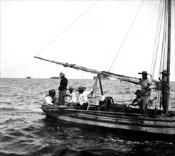 Men on boat ca.  between 1918 and 1920