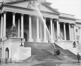 Men washing the U.S. Capitol ca.  between 1918 and 1920