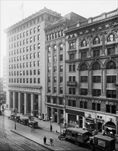 Cars parked outside the Central Savings Bank building ca.  between 1918 and 1928