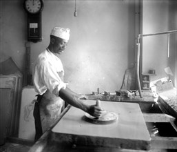 African American man in the process of map making, Interior Department ca.  between 1918 and 1928