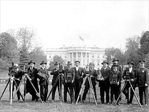 Group of camera men in front of the White House ca.  between 1918 and 1928