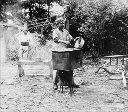 Man cooking food at French field kitchen ca.  between 1918 and 1928