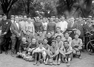 Sports team group photo with trophy ca.  between 1918 and 1921