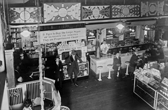 Aerial view of interior of People's Drug Store, 7th and E Streets, Washington, D.C., with soda fountain ca. between 1909 and 1932